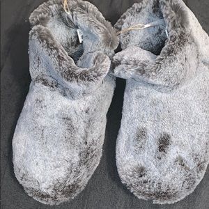 Never worn before grey fuzzy house shoes!